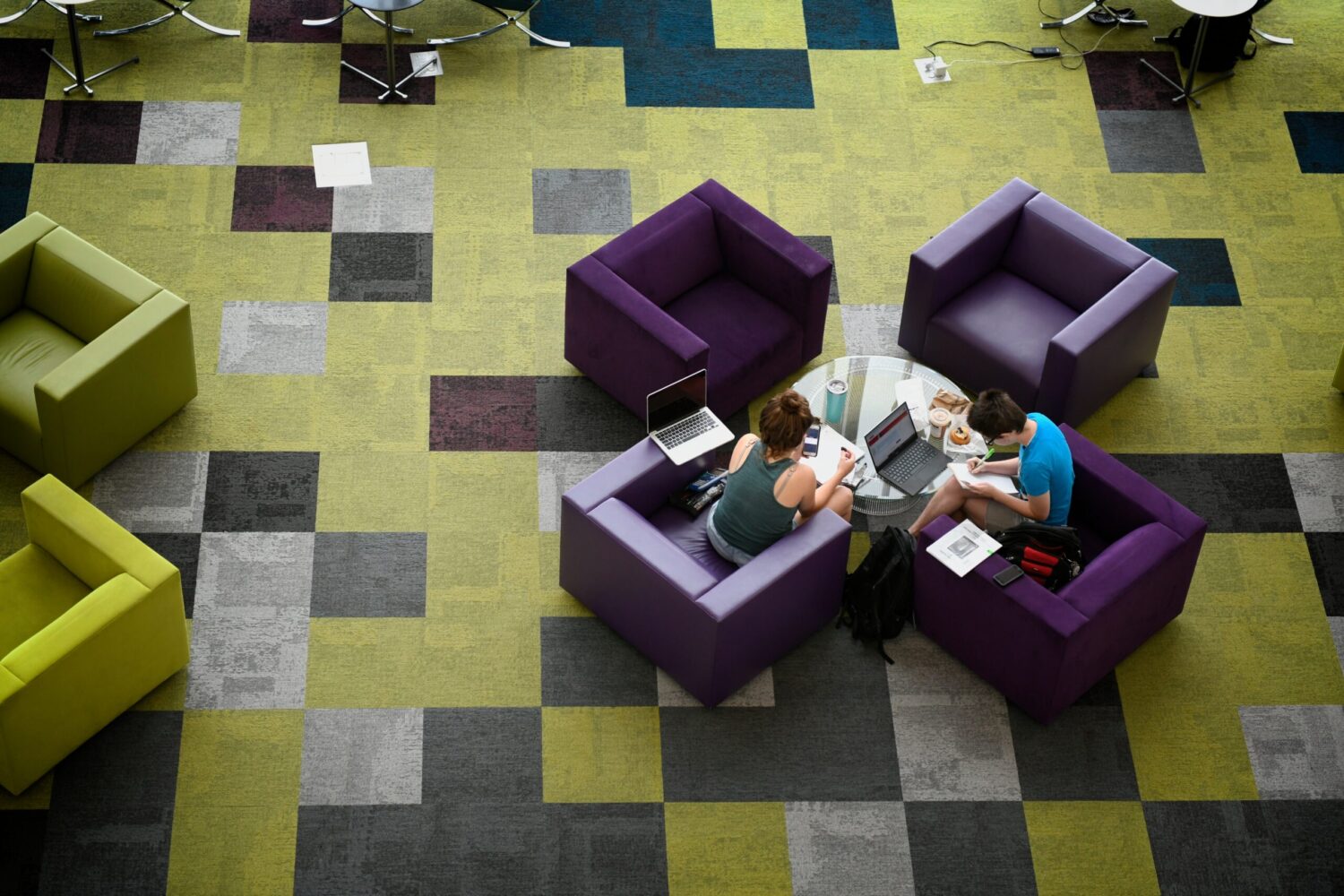 two students studying at hunt library