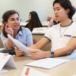 Students collaborating in MBA 560 class