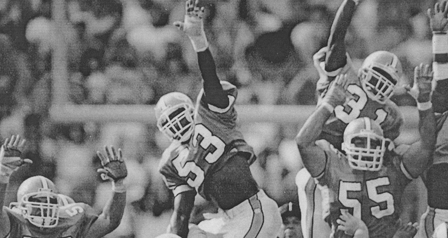 Several Tar Heel players attempt to block Hartman's field goal.