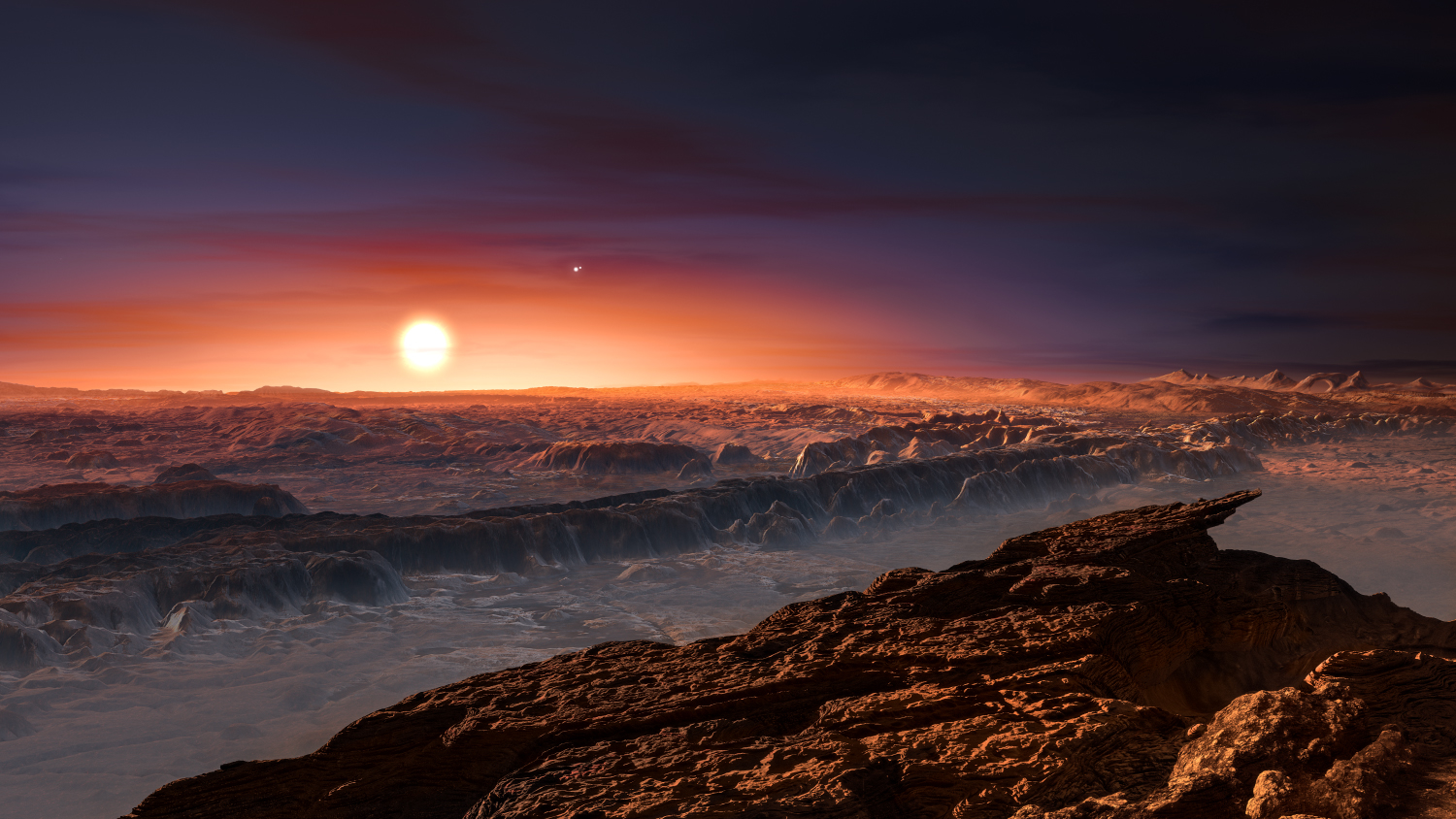 a rocky plain with a star rising above the horizon