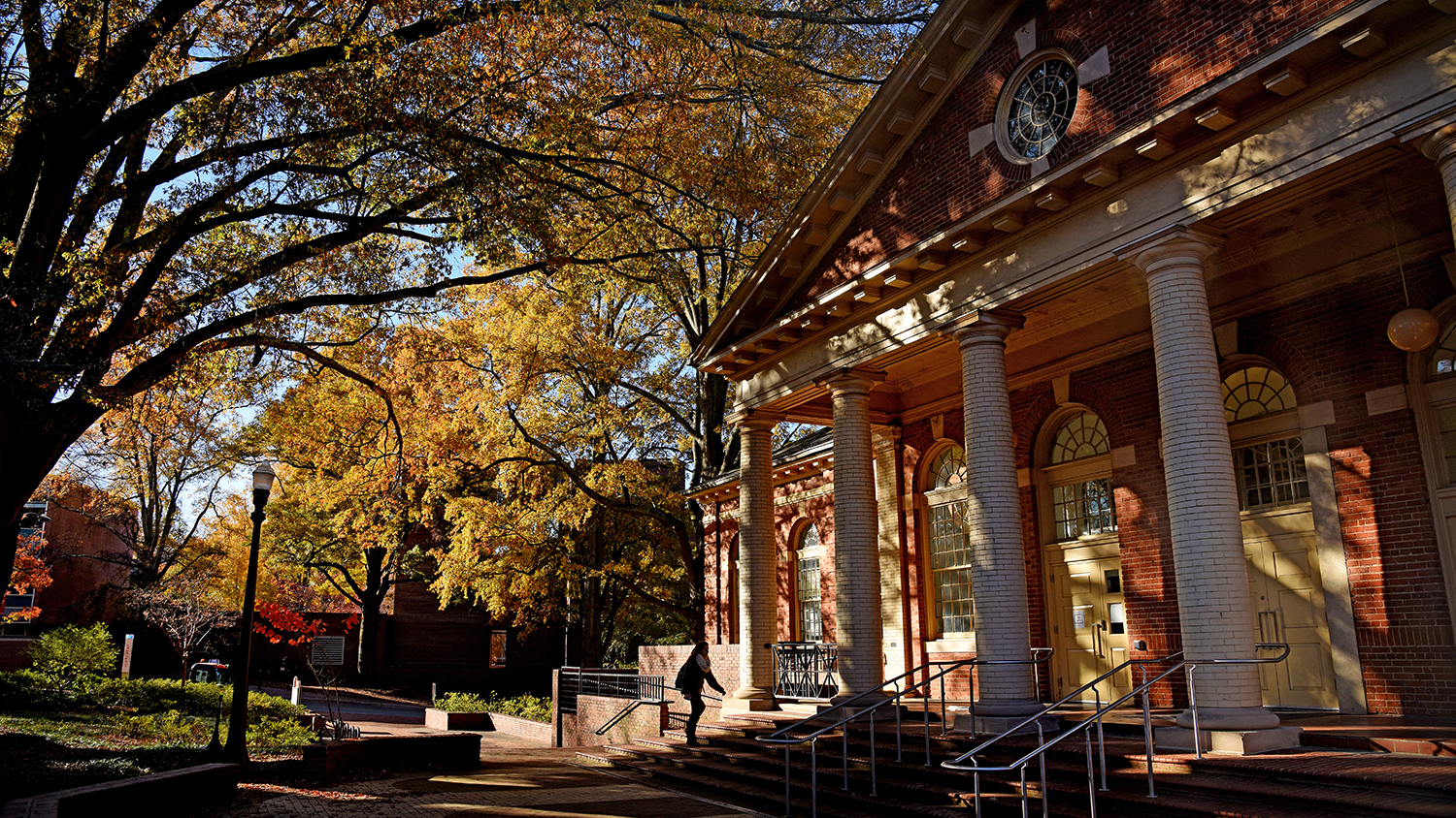 Morning fall sun casts a glow on the College of Design's Leazer Hall.