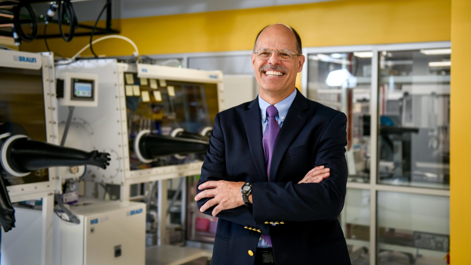 Dr. Harald Ade stands in his lab.