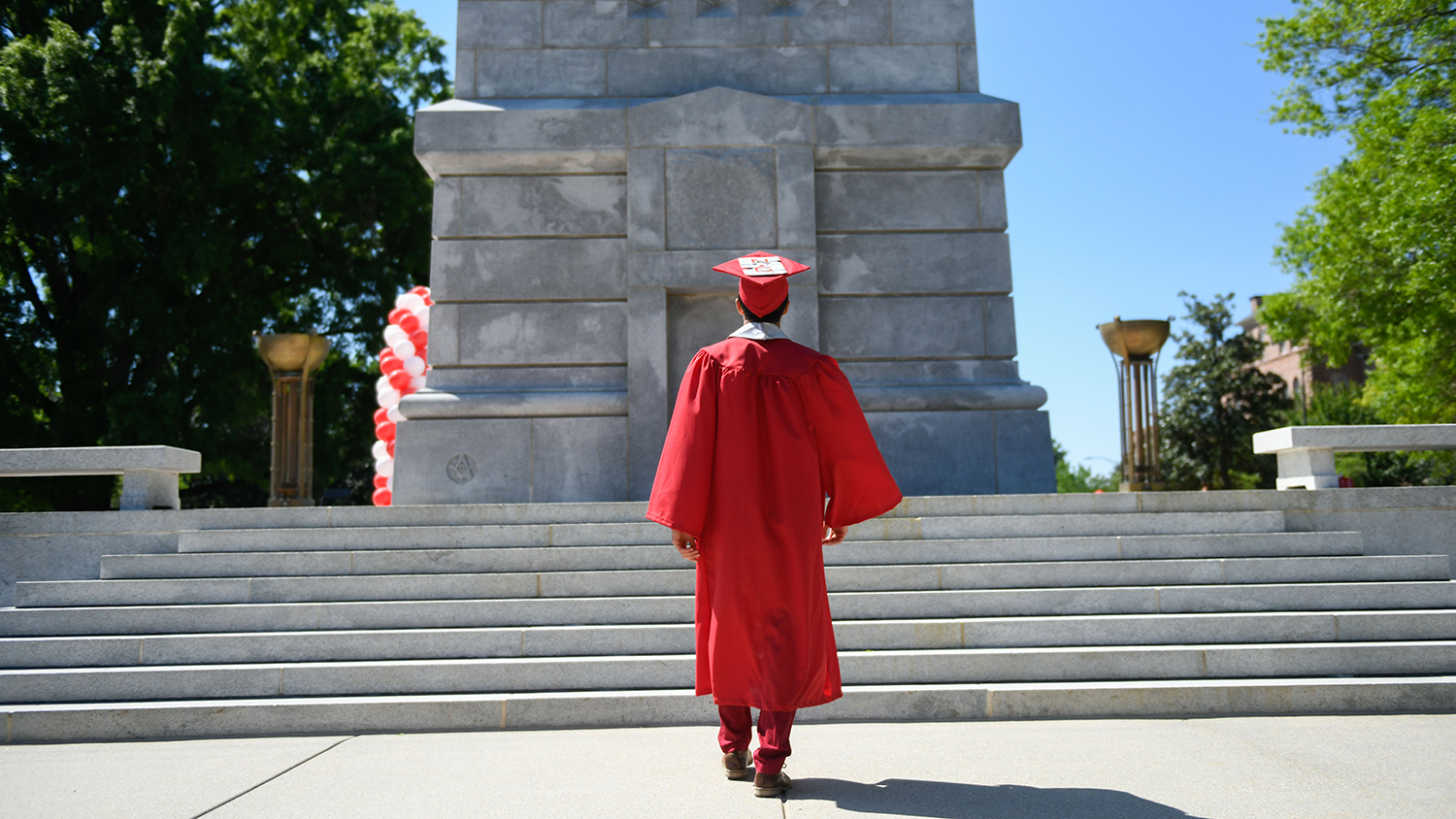 graduate at Memorial Belltower