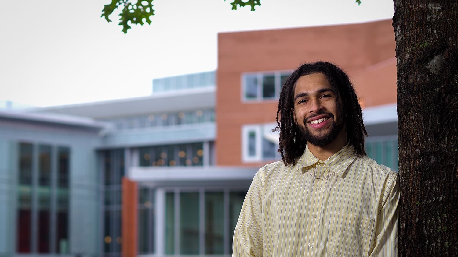 Gino Fernandes II in front of the Talley Student Union